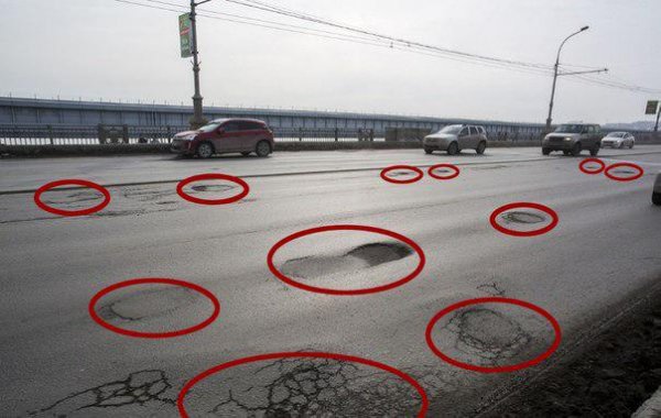 11 ям на 10 метрах: Коммунальный мост в Новосибирске превратился в «поверхность Марса»